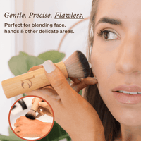 Woman using a makeup brush with text highlighting its features