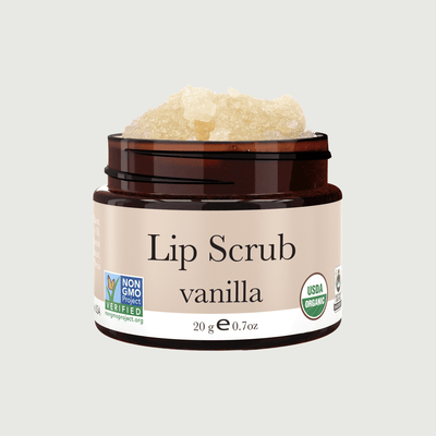 Jar of vanilla lip scrub with a beige background