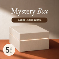 Mystery box with 5 products on a brown surface