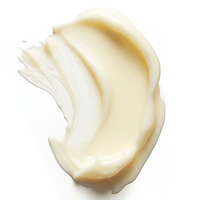 Close-up of a swirl of white cream on a white background
