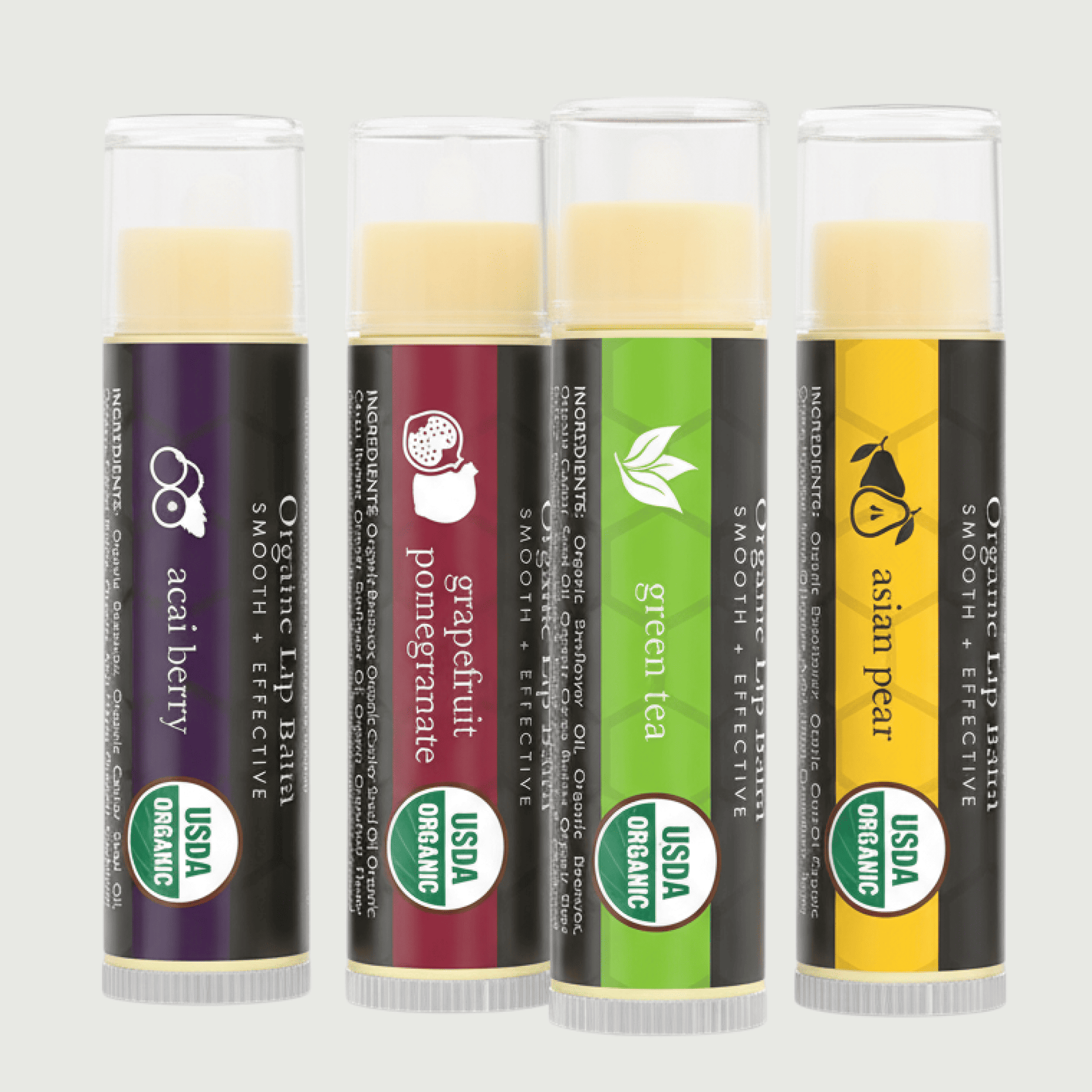 Four organic lip balm tubes with different flavors on a white background