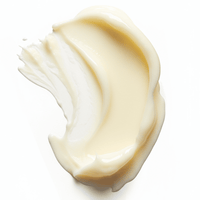 Close-up of a swirl of white cream on a white background