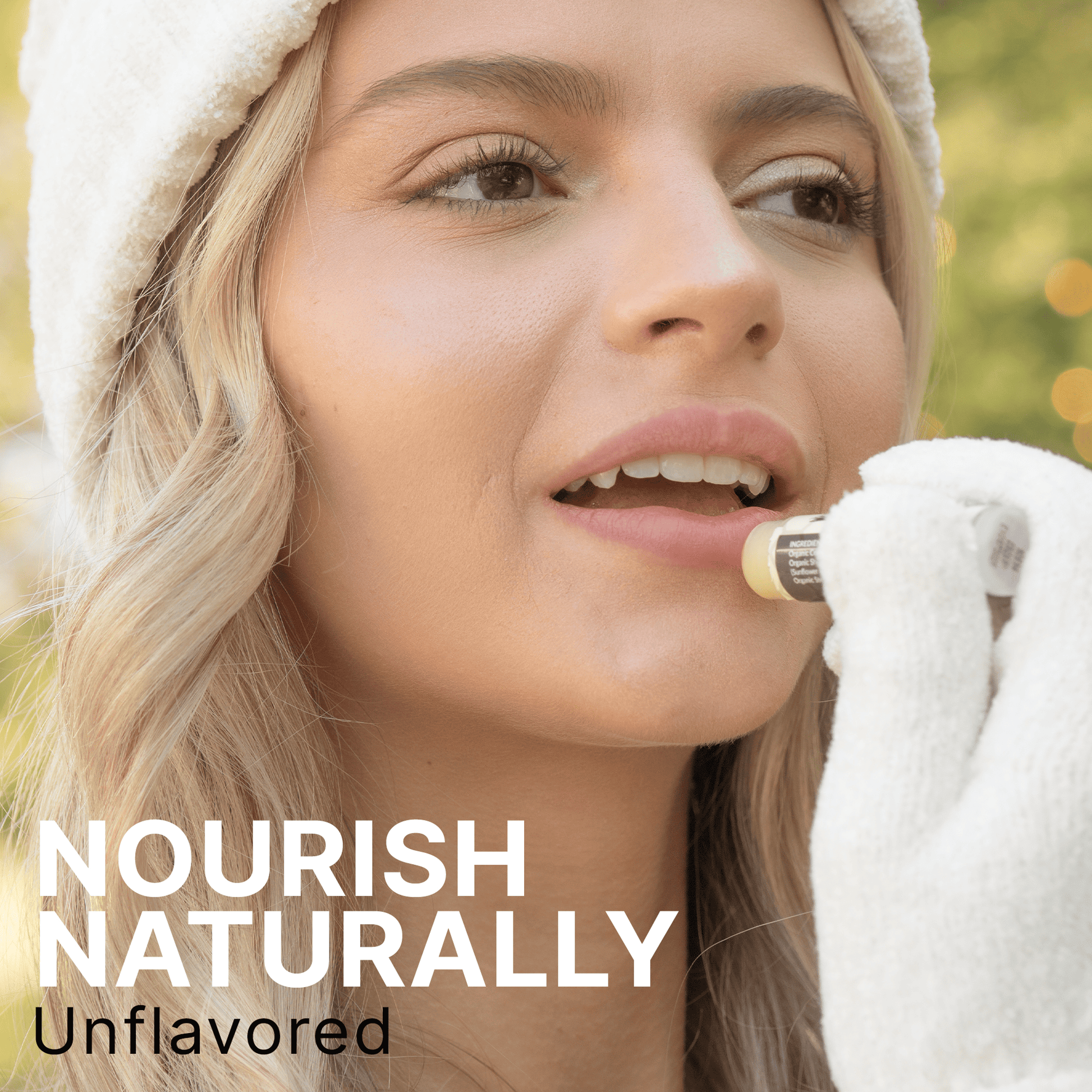 Woman applying lip balm with text 'Nourish Naturally Unflavored' on a blurred outdoor background