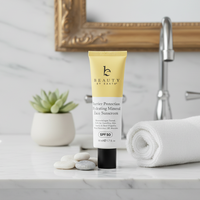 Tube of beauty by earth sunscreen on a marble surface with decorative elements