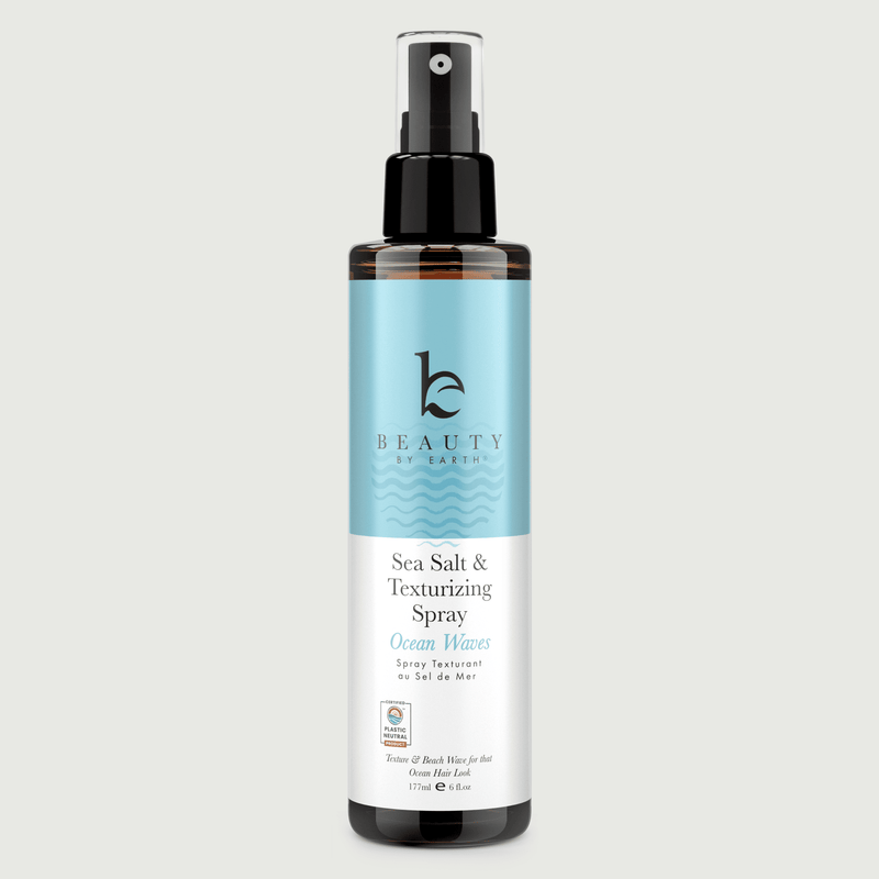 Sea Salt & Texturizing Spray bottle with blue label Ocean Waves on a light grey background