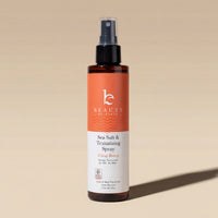 Sea Salt & Texturizing Spray bottle on a beige background