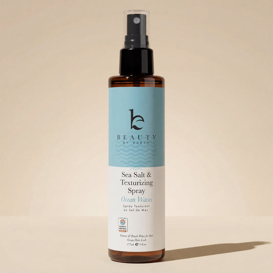 Sea Salt & Texturizing Spray bottle on a beige background