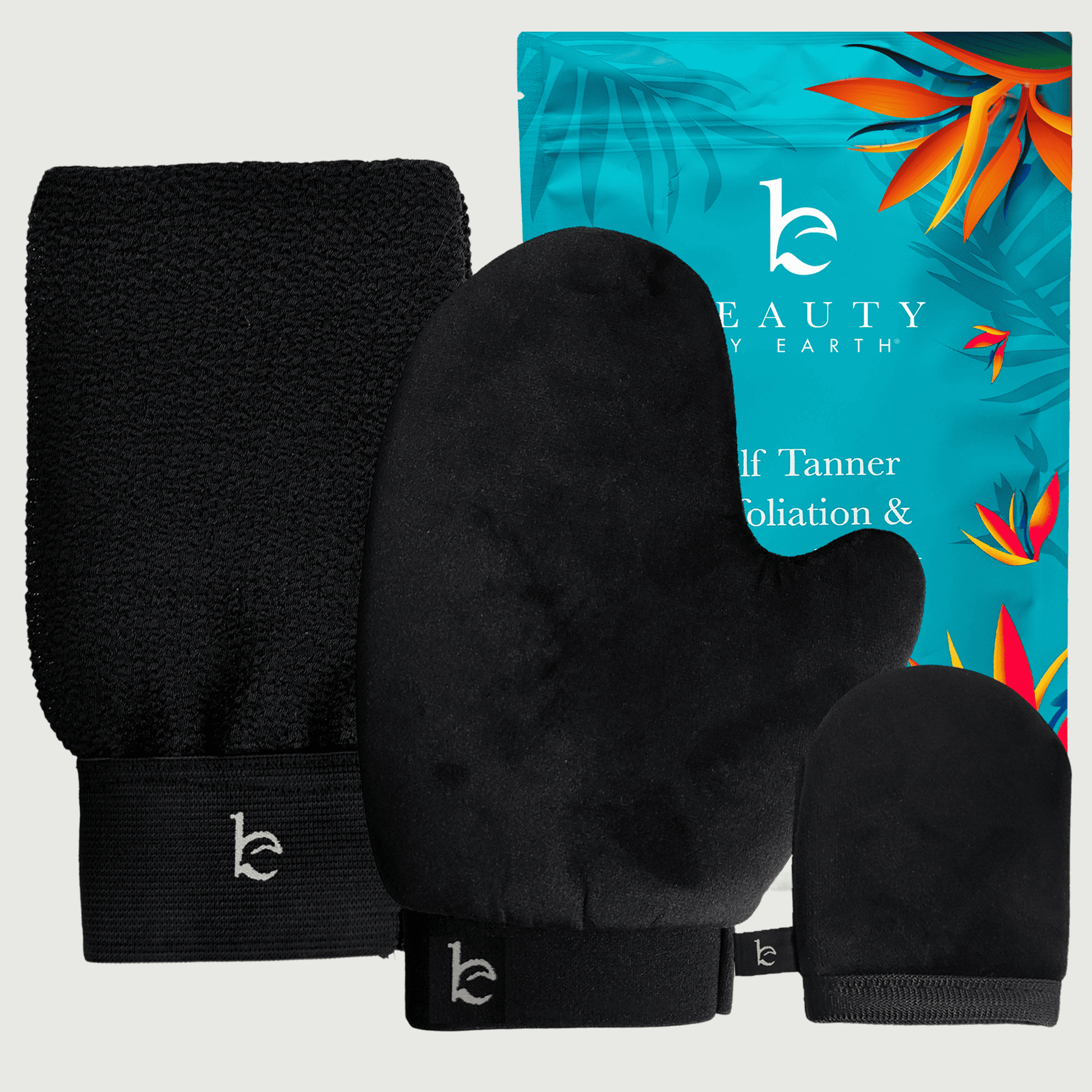 Black mittens and headband with 'Beauty by Earth' packaging featuring tropical designs.