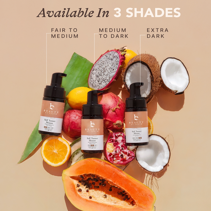 Three bottles of st mousse with tropical fruits on a beige background, indicating color options.