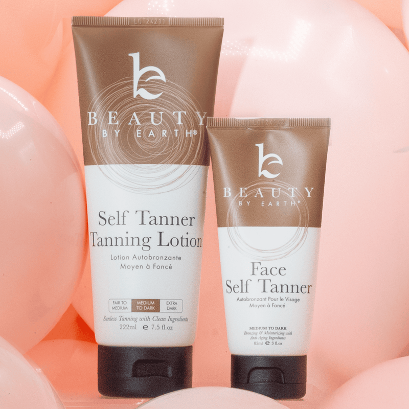 Lifestyle shot of tubes self tanning body lotion and face lotion next to each other - balloons are in the background