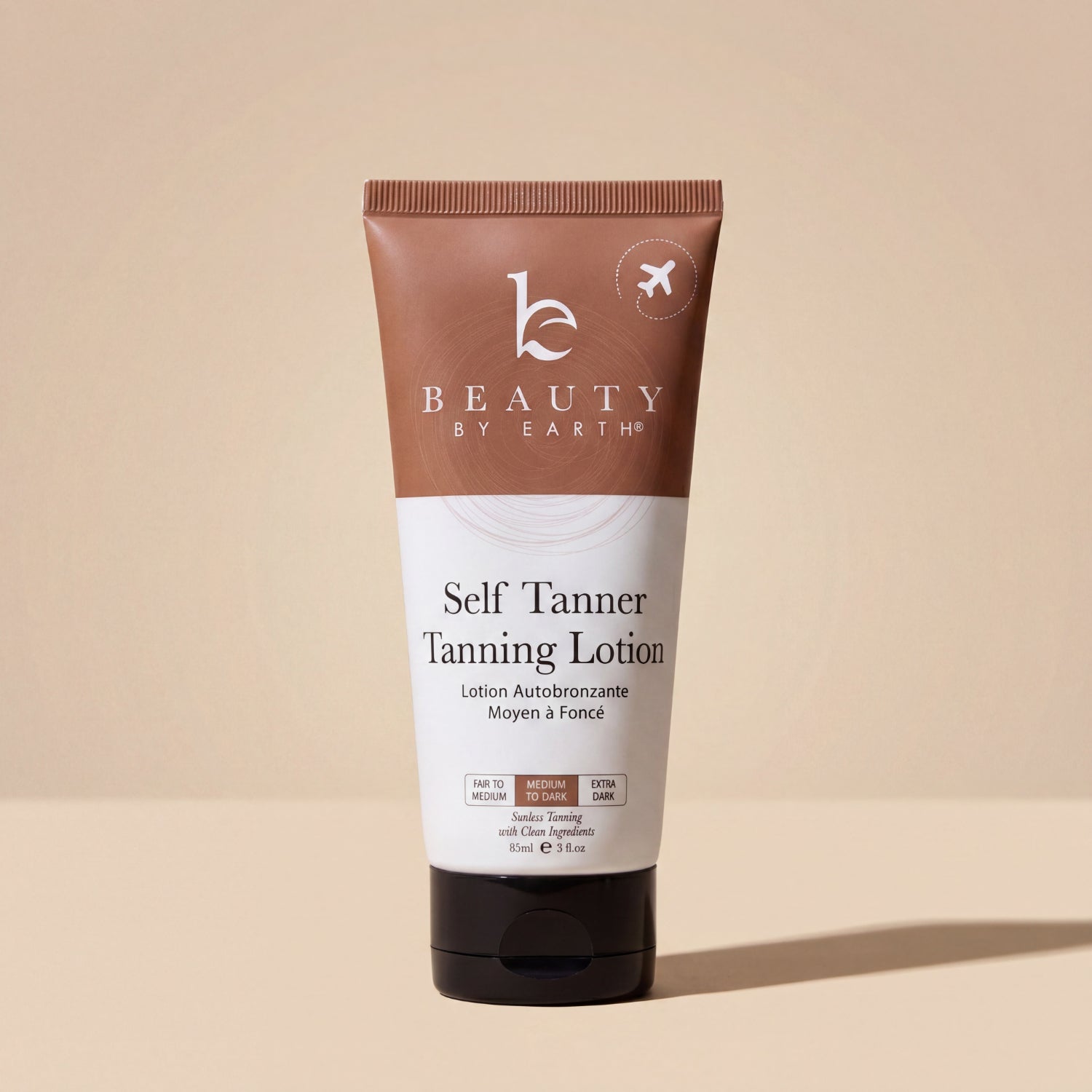 Tube of Beauty by Earth Self Tanner Tanning Lotion on a beige background