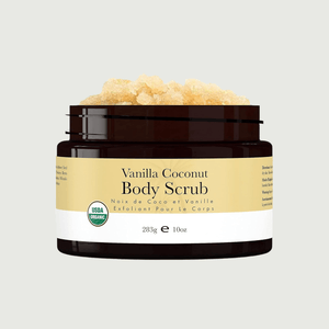 Vanilla Coconut Body Scrub jar with visible scrub on a light gray background