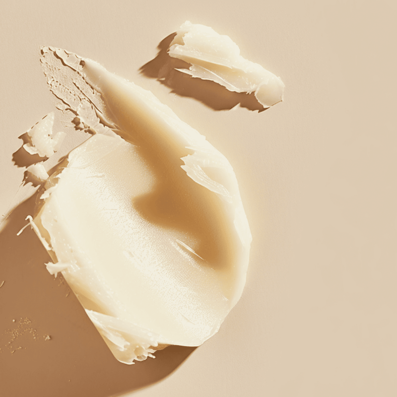Close-up of beige cream on a beige background