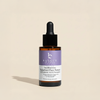 Bottle of Beauty by Earth Bakuchiol Face Serum with Hyaluronic Acid - Botanical Retinol Alternative on a beige background