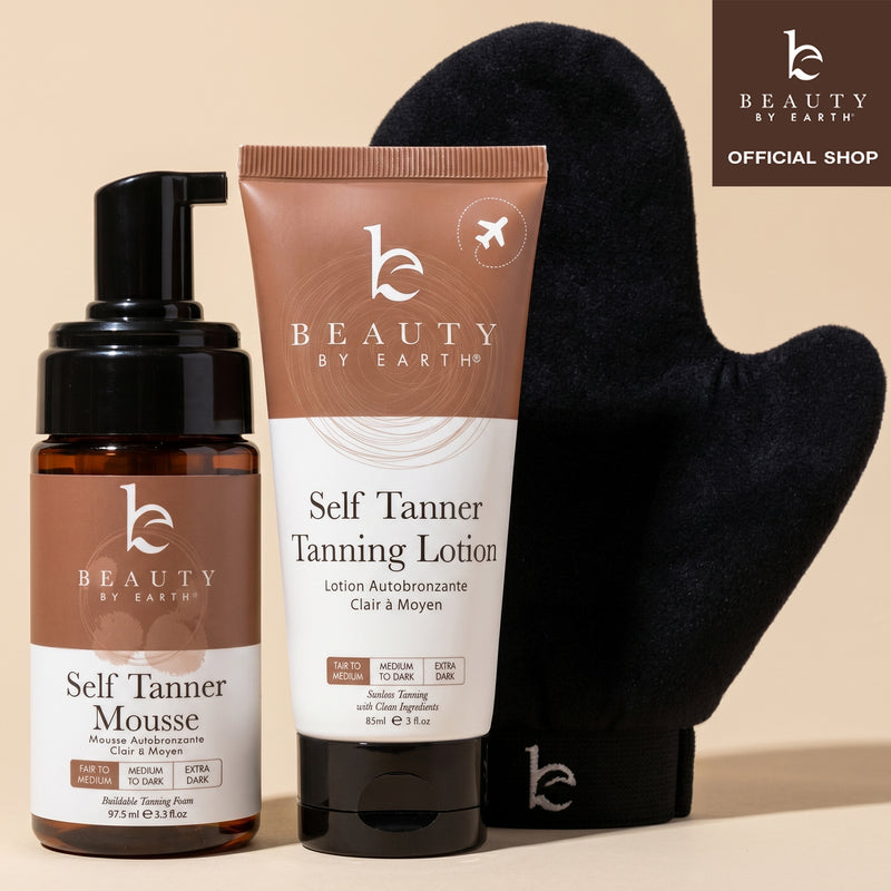 Beauty by Earth self Tanner mousse and tanning lotion with a black mitt on a beige background.