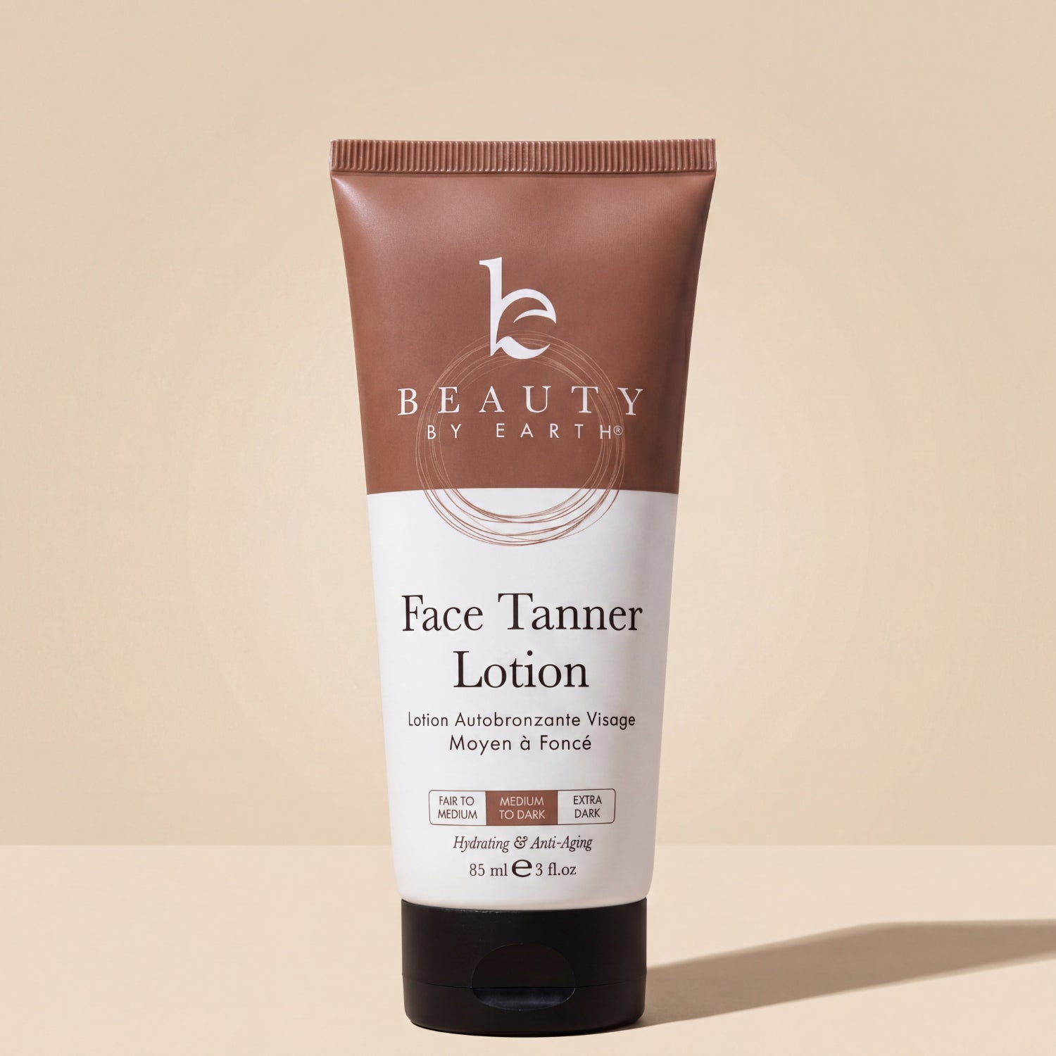 Tube of Beauty by Earth Face Tanner Lotion on a beige background