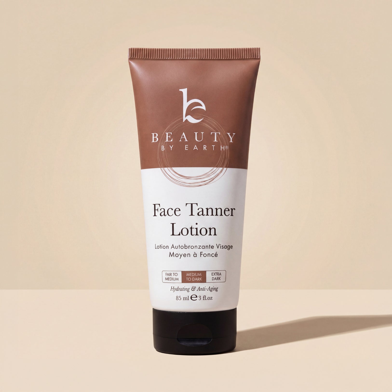 Tube of Beauty by Earth Face Tanner Lotion on a beige background
