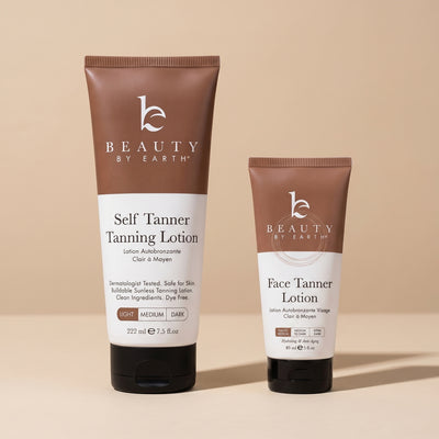 Two tubes of 'Beauty by Earth' tanning lotion on a beige background